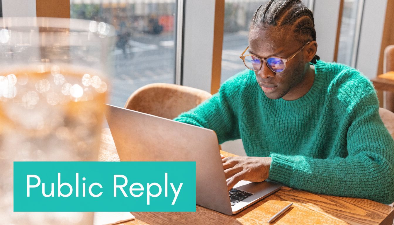 A man wearing a green sweater using a laptop at a table with text overlay reading Public Reply.